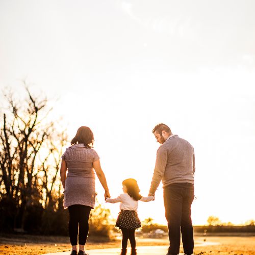 Family walking down a pathway