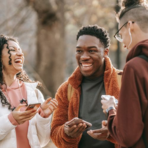 Young adults sharing in laughter.